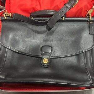 Coach Black Laptop Bag with Leather Material and Adjustable Strap